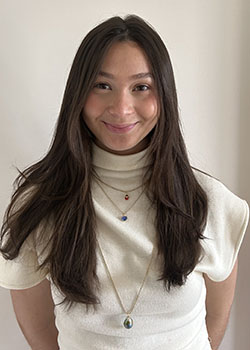 Occidental College student Gabi Cohen with a white sweater