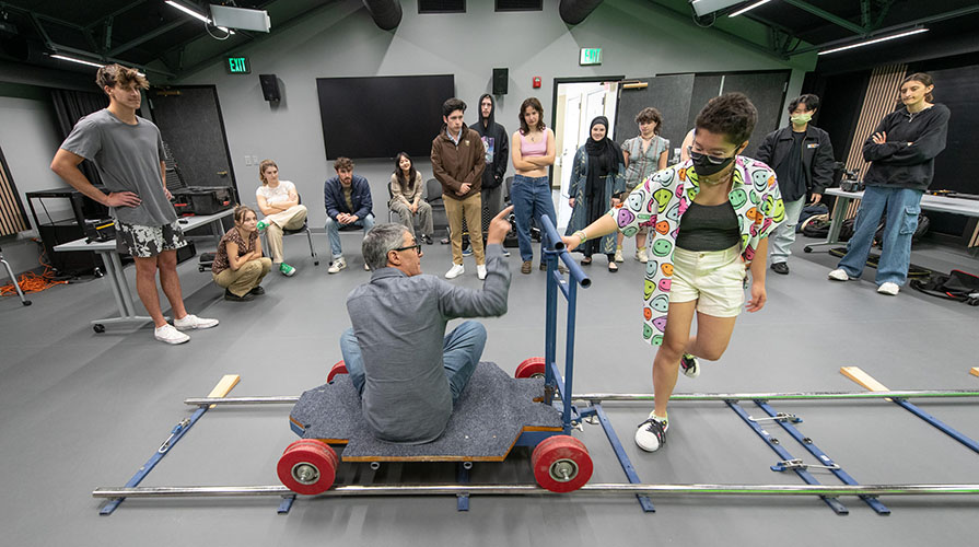 Occidental professor Aleem Hossain teaching in MAC’s new Media Production Classroom