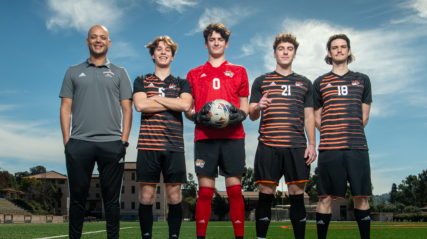 Coach Rod Lafaurie and members of the 2023 men's soccer team