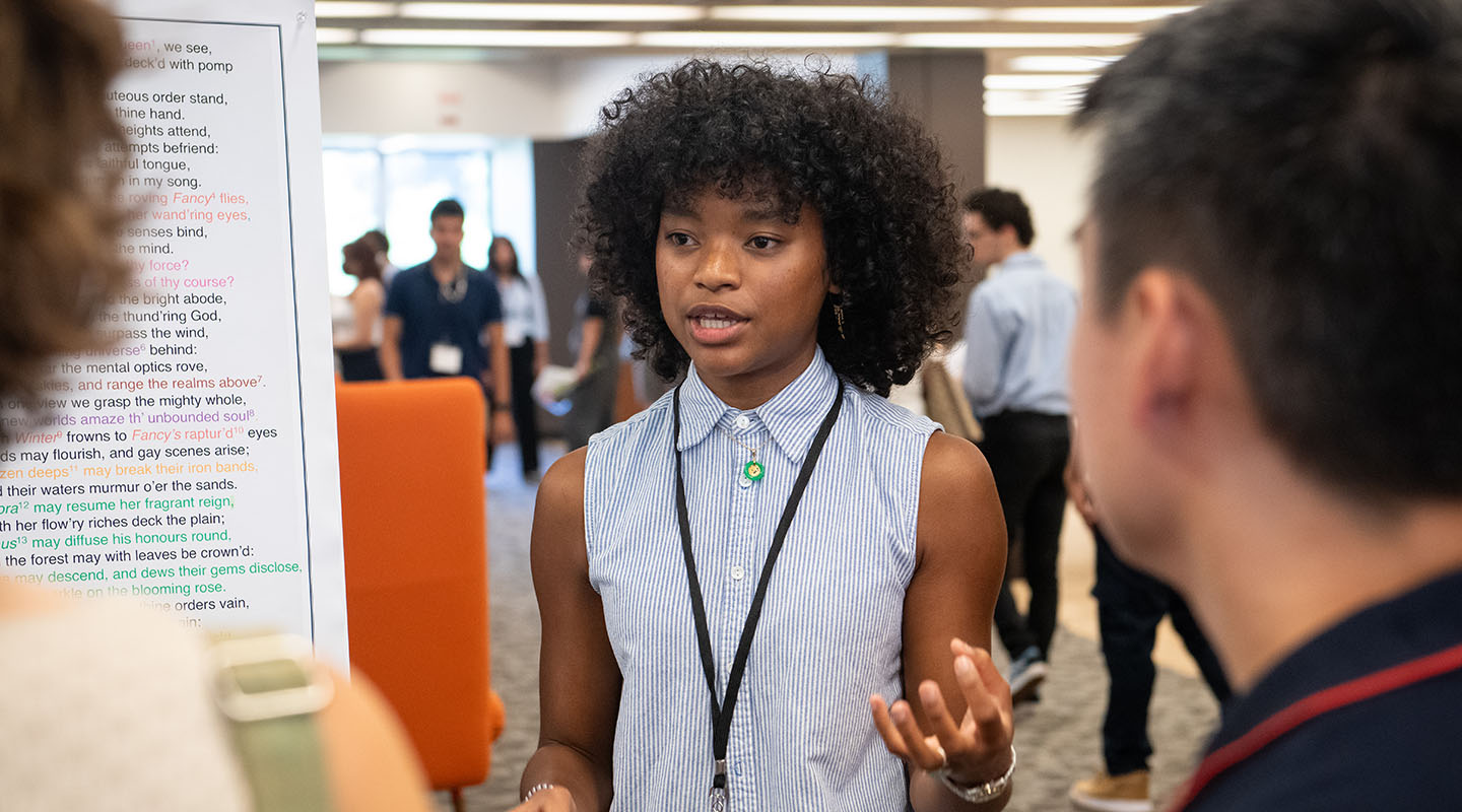 An Occidental College student presents her original research at the Summer Research Conference on campus