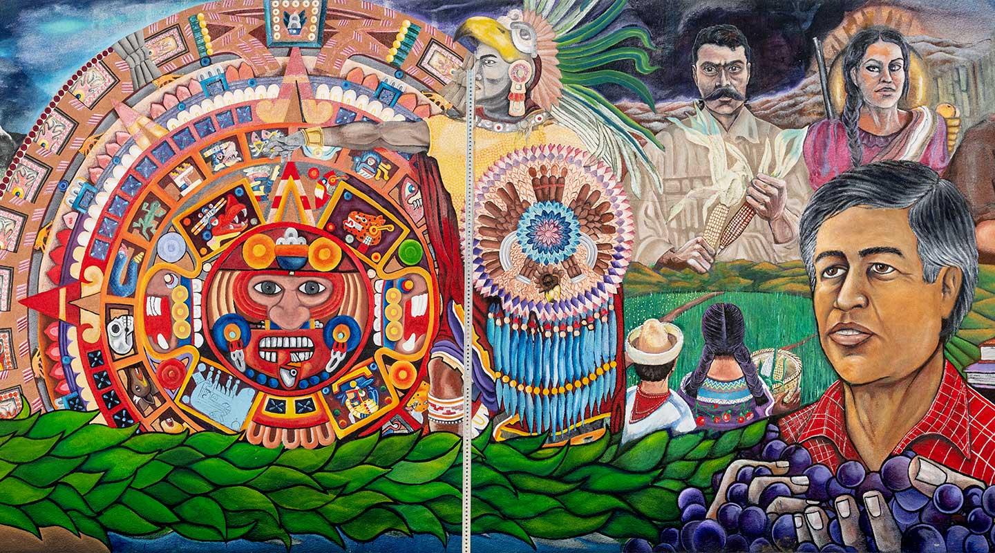 a mural showing Latin American history