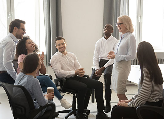 a group of diverse professional colleagues talking together