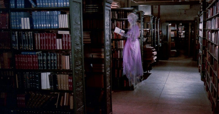 library stacks with a ghost hovering reading a book