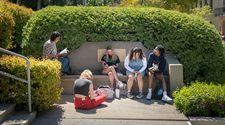 Occidental College professor Leila Neti teaching her students outdoors, on campus