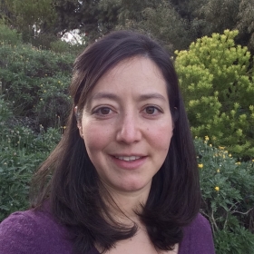 Woman in front of plants