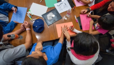 The California Immigration Semester (CIS) and Center for Community Based Learning (CCBL) hosts a group of local elementary school students as part of a "Day at College" event. 