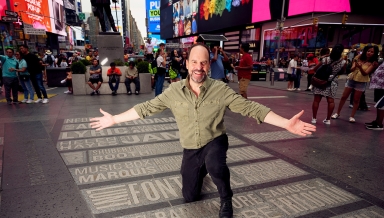 Actor Loren Lester ’83 in Times Square 