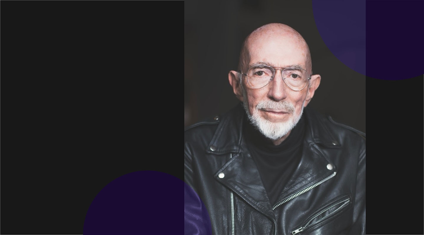 Kip Thorne in a black leather jacket and glasses