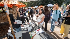 students talking to employers at the Occidental College Career Fair on the Quad