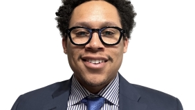 Man with tie in front of white background