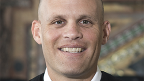 Judge John B. Owens headshot in court