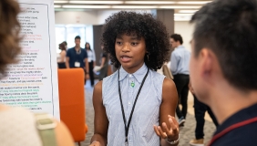 An Occidental College student presents her original research at the Summer Research Conference on campus