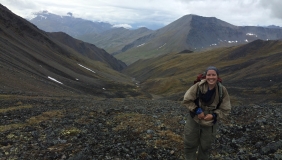 Carly Phillips in front of mountains