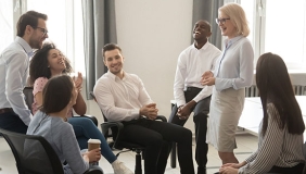 a group of diverse professional colleagues talking together