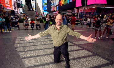 Actor Loren Lester ’83 in Times Square 