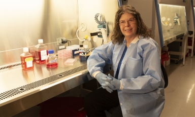 Professor of Biology Roberta Pollock, photographed in her lab in April 2024.