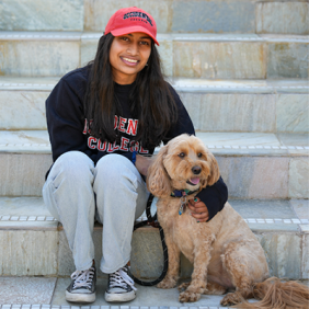 Maya Reddy and her tan dog