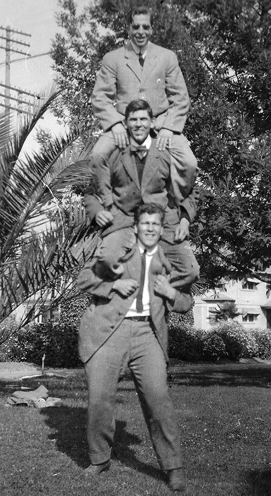 OMA members Ray Schauer 1912, William Smart 1914, and Hugh McNary 1914 pose after their initiation into the fraternity.